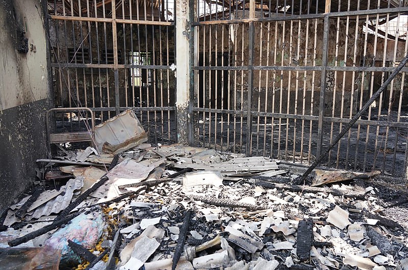 Debris is seen Wednesday inside a charred prison cell after a fire in Tangerang, Indonesia. More photos at arkansasonline.com/99tangerang/.
(AP/Indonesian Ministry of Justice and Human Rights)