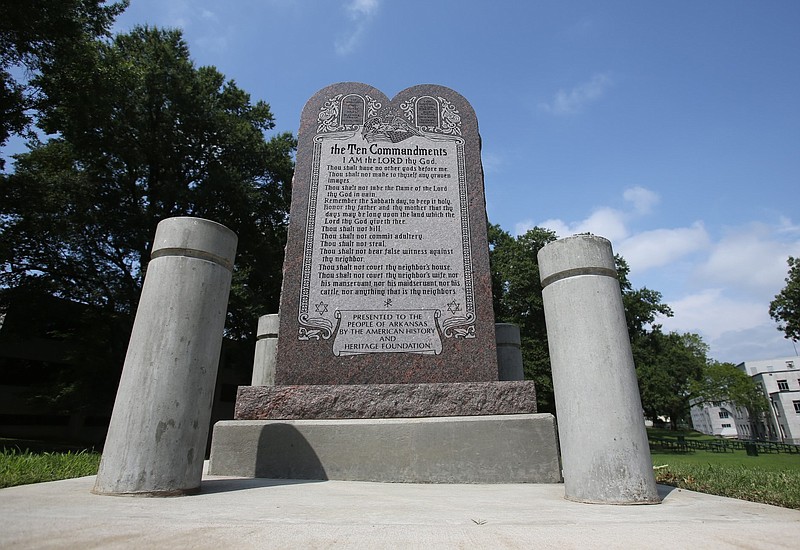 The Ten Commandments monument at the state Capitol in Little Rock is shown in thus July 4, 2020, file photo. (Arkansas Democrat-Gazette/Thomas Metthe)
