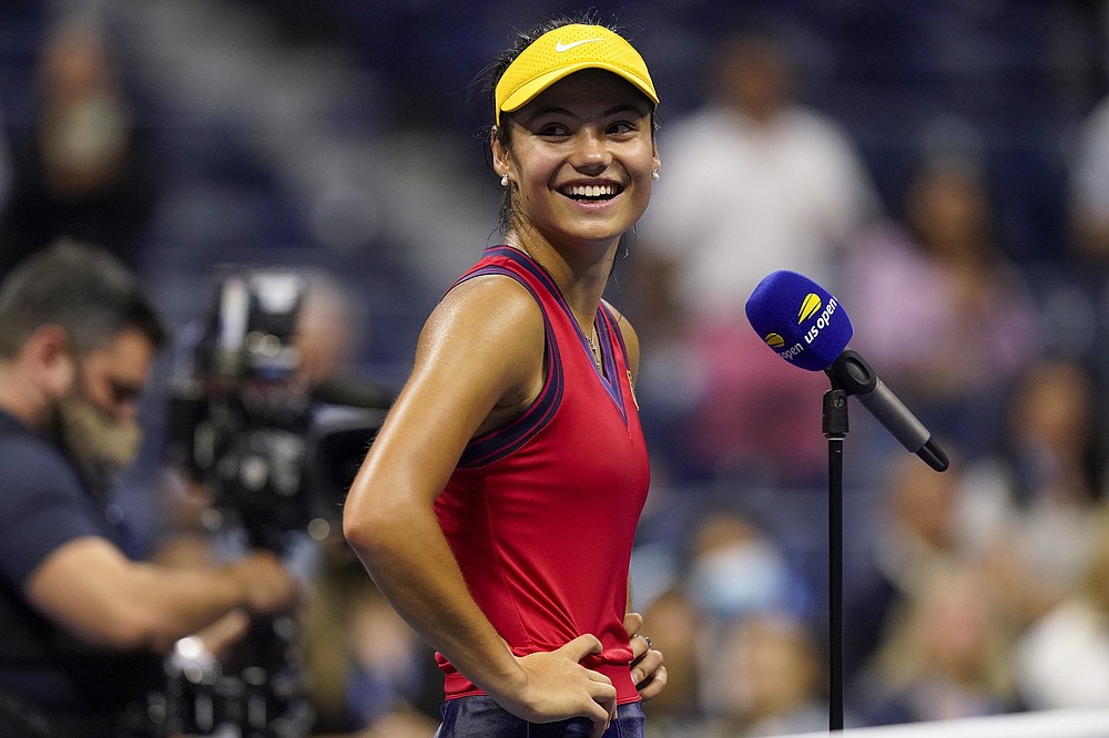 Emma Raducanu, of Great Britain, reacts after defeating Maria Sakkari, of Greece, during the semifinals of the US Open tennis championships, Thursday, Sept. 9, 2021, in New York. (AP Photo/Seth Wenig)