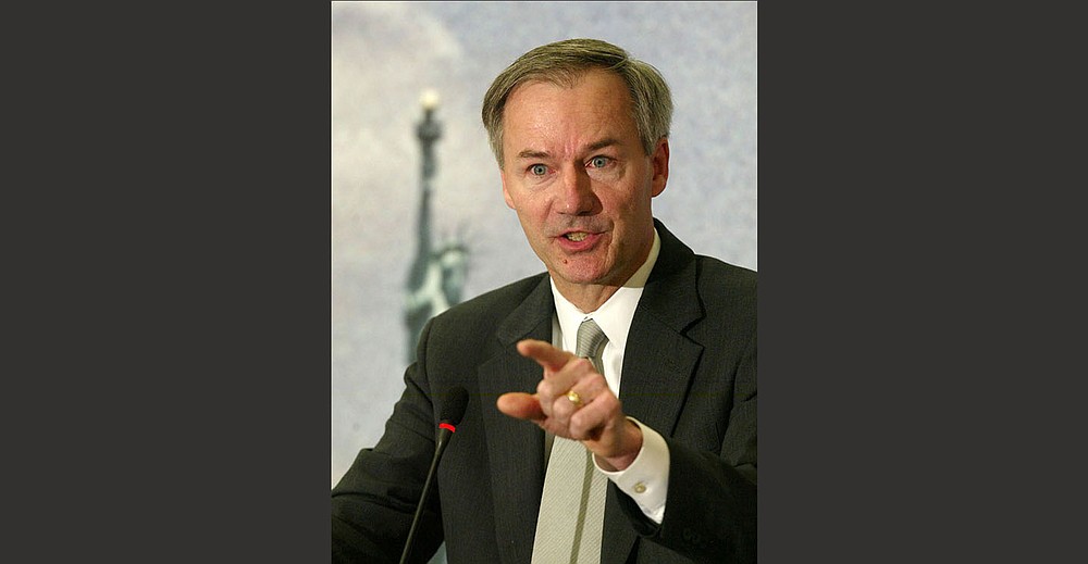Then-Homeland Security Undersecretary Asa Hutchinson speaks at a news conference May 19, 2003, in Washington as he releases details of a program using fingerprints or newer technologies such as iris scans and digital photos to track tourists, students and business travelers from foreign countries. “You just kind of build a new system, a new department of government, but you’re action-oriented,” Hutchinson said recently of the agency’s mission.
(AP file photo)