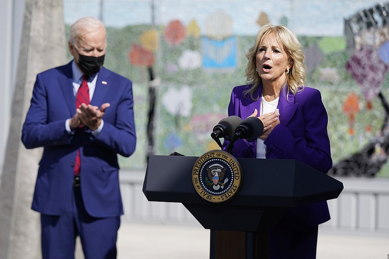 First lady Jill Biden speaks Friday as she and President Joe Biden talk up vaccinations during a tour of a middle school in Washington, D.C. More photos at arkansasonline.com/911covid19/
(AP/Manuel Balce Ceneta)