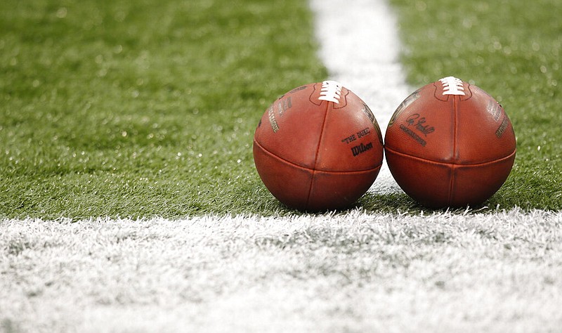 Footballs are shown before the start of a game in this Sept. 1, 2011, file photo. (AP/Andy King)