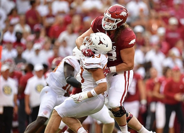 Arkansas offensive lineman Dalton Wagner (78) blocks Texas linebacker Marcus Tillman (13) during a game Saturday, Sept. 11, 2021, in Fayetteville. Arkansas offensive lineman Dalton Wagner (78) blocks Texas linebacker Marcus Tillman (13) during a game Saturday, Sept. 11, 2021, in Fayetteville.