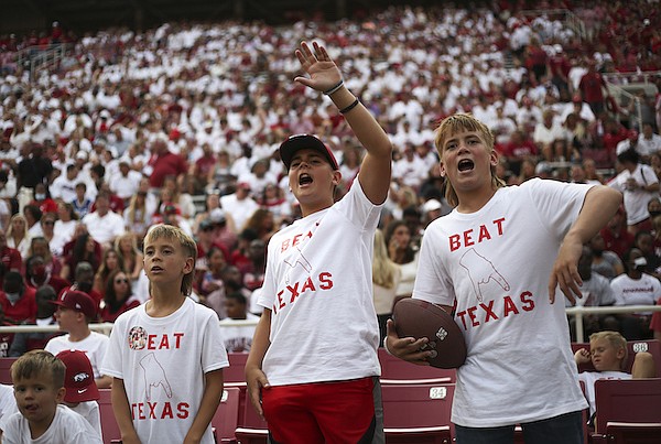 From left, Paton, Silas, Joshua and Caleb Everett of Greenbrier cheer during a game between Arkansas and Texas on Saturday, Sept. 11, 2021, in Fayetteville. From left, Paton, Silas, Joshua and Caleb Everett of Greenbrier cheer during a game between Arkansas and Texas on Saturday, Sept. 11, 2021, in Fayetteville.