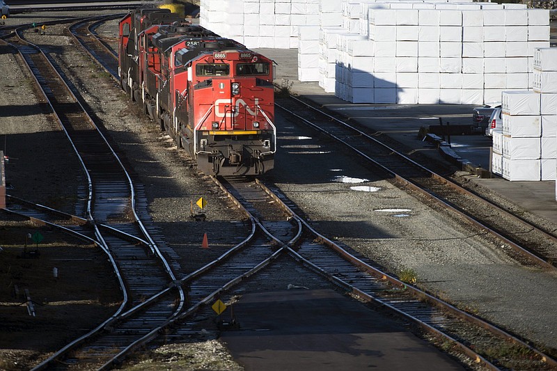 Canadian National locomotives idle in a rail yard in North Vancouver, British Columbia, in 2019. Canadian National on Wednesday dropped out of the bidding for the Kansas City Southern railroad, giving Canadian Pacifi c a clear track.
(AP)