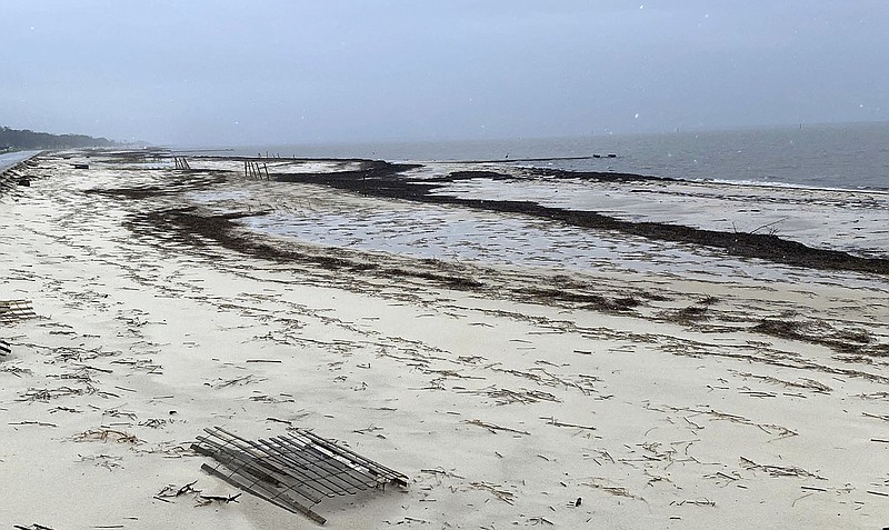 A flash-flood warning remained in effect Wednesday for beaches at Pass Christian in Harrison County, Miss., after debris from Hurricane Ida was pushed ashore by remnants of Nicholas.
(AP/The Gazebo Gazette/Hunter Dawkins)