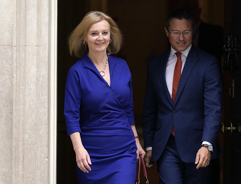 Britain’s new Foreign Secretary Liz Truss leaves 10 Downing Street, in London on Wednesday.
(AP/Alberto Pezzali)