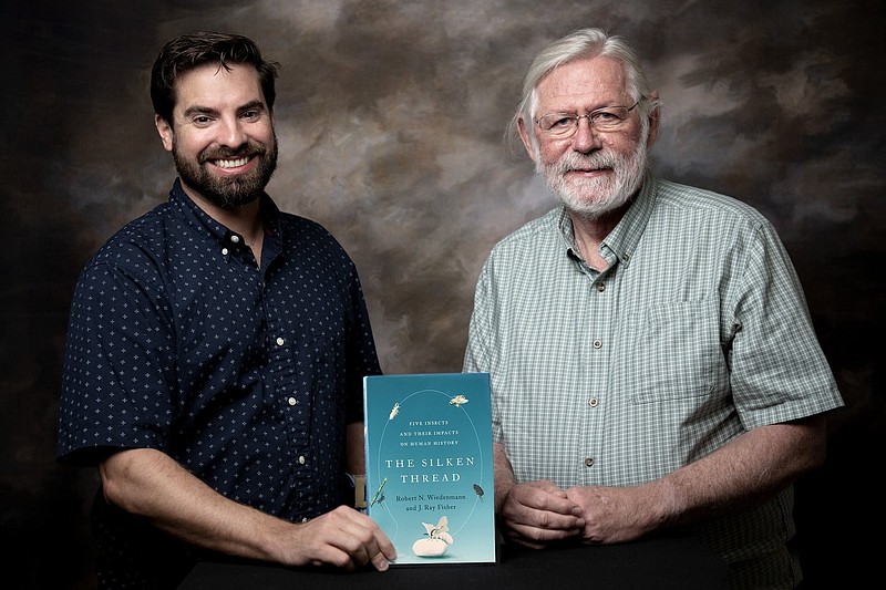 Ray Fisher (left) and Rob Wiedenmann wrote “The Silken Thread, Five Insects and Their Impacts on Human History.” Fisher is a research scientist in entomology. Wiedenmann is a professor emeritus and former entomology department head. 
(Special to The Commercial/UA System Division of Agriculture/Fred Miller)