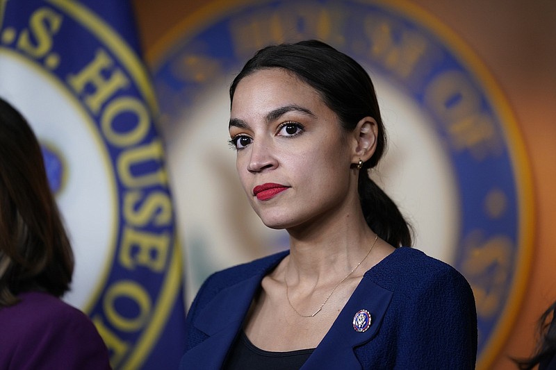 U.S. Rep. Alexandria Ocasio-Cortez attends a June news conference held by House Speaker Nancy Pelosi at the Capitol. Ocasio-Cortez is among the progressive Democrats pushing for full implementation of the $3.5 trillion spending plan.
(AP/J. Scott Applewhite)