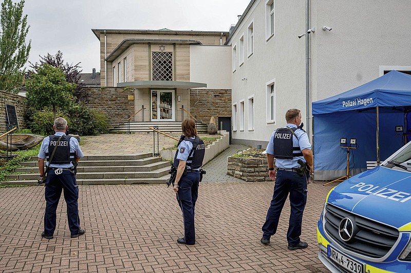 Police officers guard the front entrance Thursday of the Jewish community building in Hagen, Germany.
(AP/Henning Kaiser)