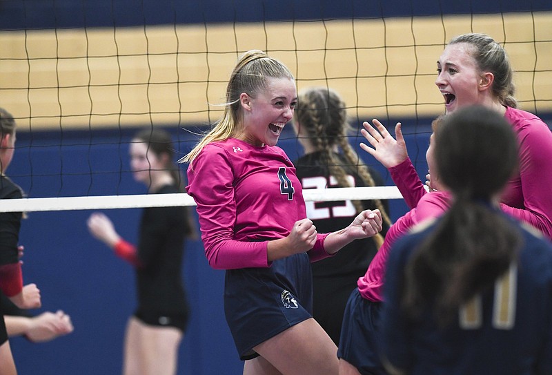 Caroline Ramsey celebrates with her teammates during Shiloh Christian’s conference match against Pea Ridge on Thursday night in Springdale. More photos are available at arkansasonline.com/917prsc/
(NWA Democrat-Gazette/Charlie Kaijo)