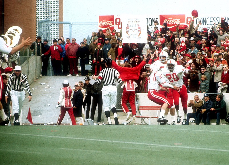 Nebraska’s Johnny Rodgers (20) celebrates in the end zone after his 72-yard punt return for a touchdown that helped the top-ranked Cornhuskers beat No. 2 Oklahoma 35-31 on Nov. 25, 1971, in Norman, Okla. Nebraska and Oklahoma will meet today for the first time since 2010.
(AP/Lincoln Journal Star file photo)