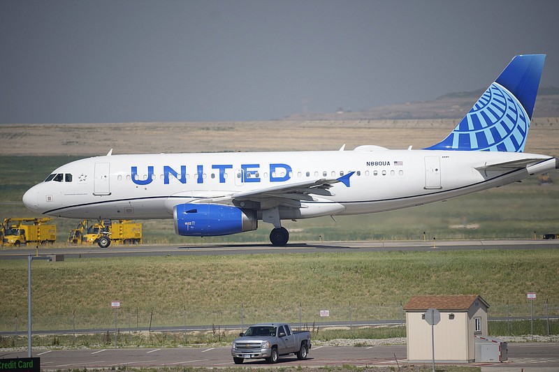 In this file photo, a United Airlines jetliner taxis down a runway for take off from Denver International Airport in Colorado. The first U.S. carrier to require its employees be vaccinated, United announced Thursday that nearly 90% of its workers have received coronavirus vaccines.
(AP)