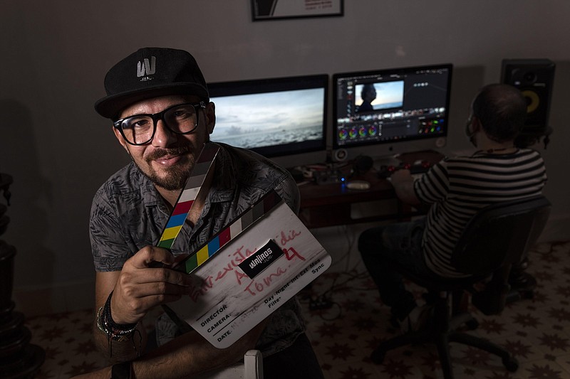 Carlos Gomez, 35, owner of the audiovisual production company Wajiros Films, poses for a photo  at his company’s editing room in Havana earlier this month.
(AP/Ramon Espinosa)