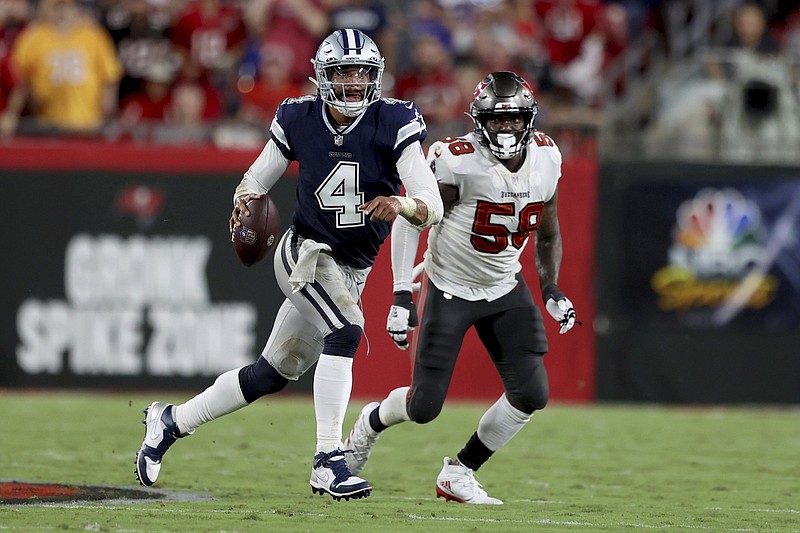 Los Angeles Chargers quarterback Justin Herbert runs with the ball during  the first half of an NFL football game against the Kansas City Chiefs  Thursday, Dec. 16, 2021, in Inglewood, Calif. (AP