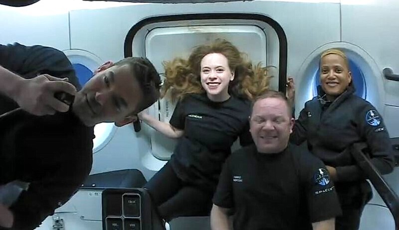 This photo provided by SpaceX shows the passengers of Inspiration4 in the Dragon capsule on their first day in space. From left are Jared Isaacman, Hayley Arceneaux, Chris Sembroski and Sian Proctor. SpaceX got them into a 363-mile orbit after Wednesday night’s launch from NASA's Kennedy Space Center. (SpaceX via AP)