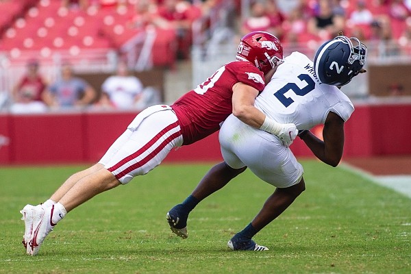 Arkansas linebacker Bumper Pool hits Georgia Southern running back Logan Wright during a game on Sept. 18, 2021 in Fayetteville. Arkansas linebacker Bumper Pool hits Georgia Southern running back Logan Wright during a game on Sept. 18, 2021 in Fayetteville.