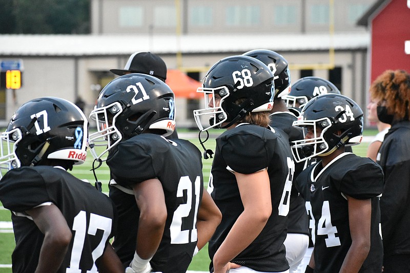 The White Hall High School Bulldogs are shown during a home game in this Friday, Sept. 3, 2021, file photo. (Pine Bluff Commercial/I.C. Murrell)