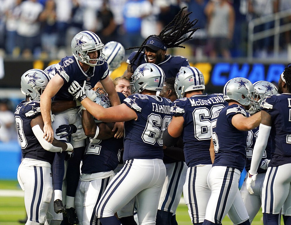 Running back (20) Tony Pollard of the Dallas Cowboys runs and scores a  touchdown against the Los Angeles Chargers in an NFL football game, Sunday,  Sept. 19, 2021, in Inglewood, Calif. The