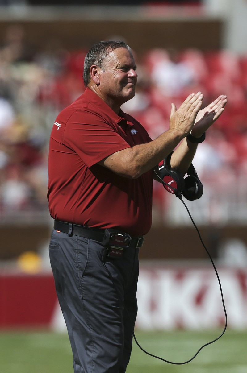 Arkansas head coach Sam Pittman applauds his players, Saturday, September 18, 2021 during the second quarter of a football game at Reynolds Razorback Stadium in Fayetteville. Check out nwaonline.com/210919Daily/ for today's photo gallery. .(NWA Democrat-Gazette/Charlie Kaijo)