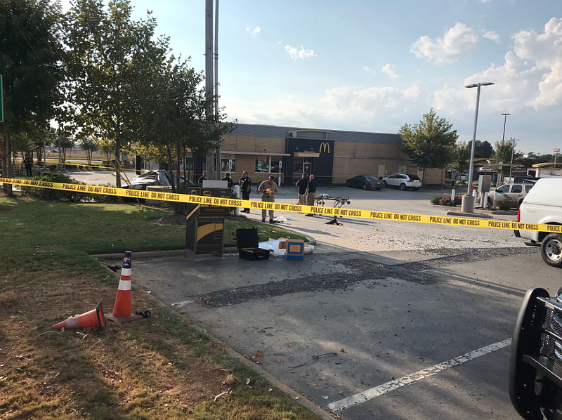 North Little Rock police investigate a shooting on McCain Boulevard on Tuesday. (Arkansas Democrat-Gazette/Tommy Metthe)