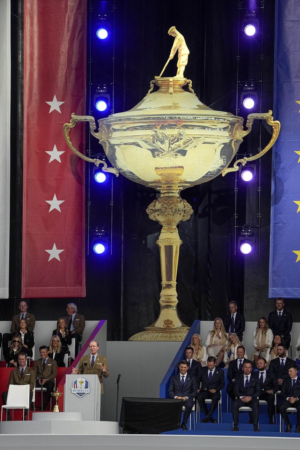 United States captain Steve Stricker (lower left) speaks from the podium during Thursday night’s Ryder Cup opening ceremonies at Whistling Straits Golf Course in Sheboygan, Wis. The competition begins this morning with foursome matches. (AP/Jeff Roberson)