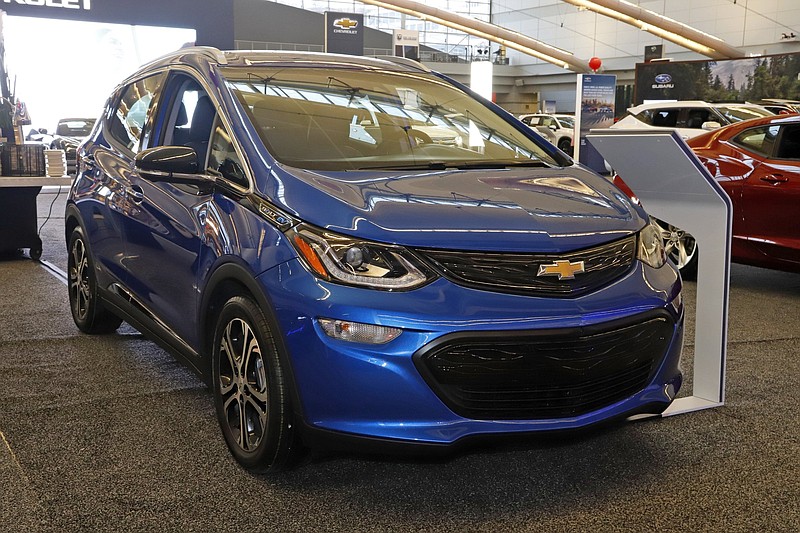 A Chevrolet Bolt electric vehicle is displayed at the 2020 Pittsburgh International Auto Show. GM’s transition to building all-electric vehicles means the business will be shifting into a software subscription service that also builds cars.
(AP file photo)