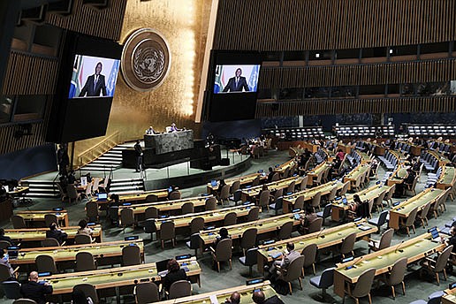 South Africa President Cyril Ramaphosa speaks by video link Thursday to the U.N. General Assembly. Ramaphosa and other African leaders urged U.N. member states to support a proposal to temporarily waive certain intellectual property rights to allow production of more covid-19 vaccines.
(AP/Spencer Platt)