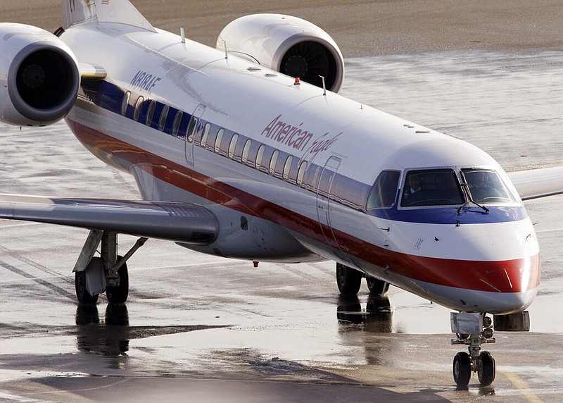 An American Eagle jet taxis at Boston's Logan International Airport in this Jan. 20, 2011, file photo. (AP/Stephan Savoia)