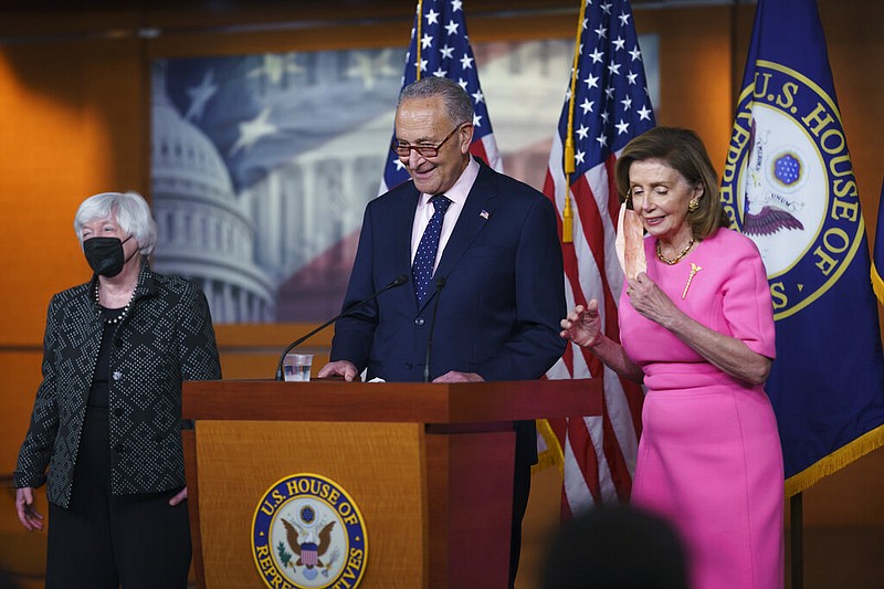 Senate Majority Leader Charles Schumer (center), D-N.Y., flanked by Treasury Secretary Janet Yellen (left) and House SpeakerNancy Pelosi, D-Calif., updates reporters on Democratic efforts to pass President Joe Biden's "Build Back Better" agenda at the Capitol in Washington on Thursday, Sept. 23, 2021. (AP/J. Scott Applewhite)