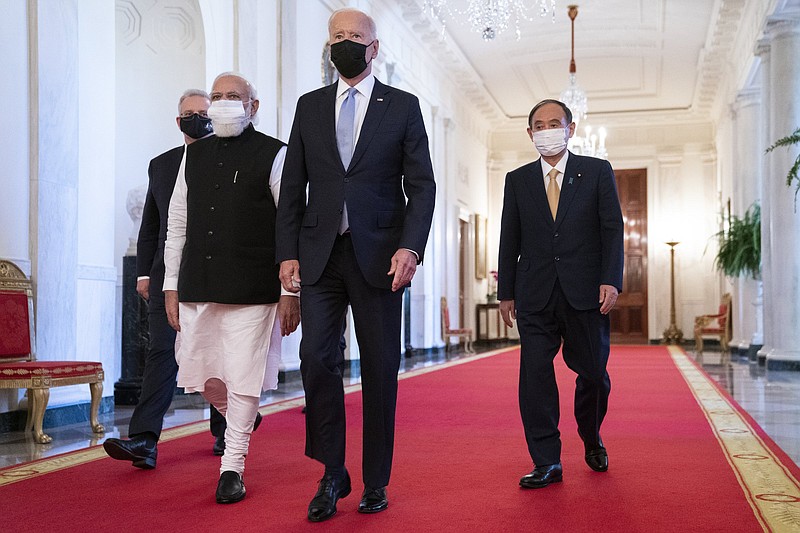 President Joe Biden walks to the Quad summit Friday at the White House with (from left) Australian Prime Minister Scott Morrison, Indian Prime Minister Narendra Modi and Japanese Prime Minister Yoshihide Suga.
(AP/Evan Vucci)