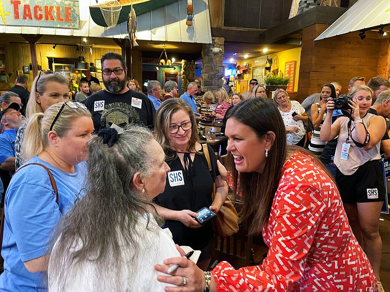 Former White House Press Secretary Sarah Sanders greets supporters at an event for her campaign for governor at a Colton's Steak House in Cabot, Ark., Friday, Sept. 10, 2021. (AP Photo/Andrew DeMillo)
