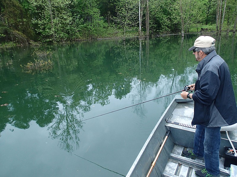 Russ Tonkinson works a buzz bait in May 2021 at Beaver Lake. Buzz baits get bass to bite during spring and summer, but fall is prime time to cast them.
(NWA Democrat-Gazette/Flip Putthoff)