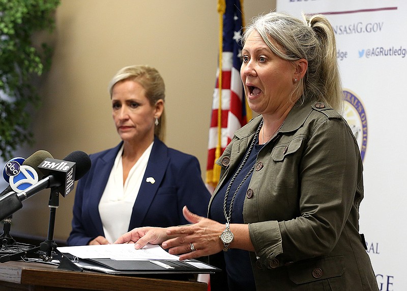 Deputy Attorney General Shannon Halijan (right) and Attorney General Leslie Rutledge discuss the state’s settlement in a lawsuit over pharmacy benefit managers Thursday in Little Rock.
(Arkansas Democrat-Gazette/Thomas Metthe)