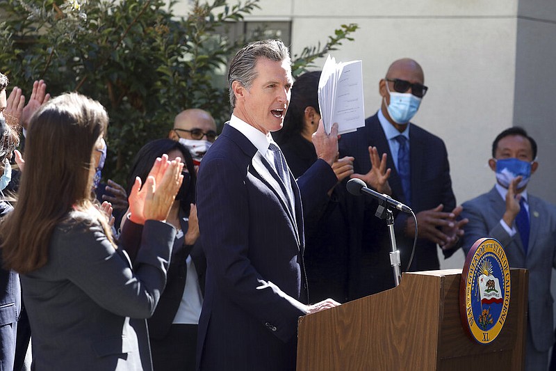 California Gov. Gavin Newsom speaks at a news conference to sign a number of housing bills at the Coliseum Connections apartment complex in Oakland, Calif., Tuesday, Sept. 28, 2021. (Aric Crabb/Bay Area News Group via AP)