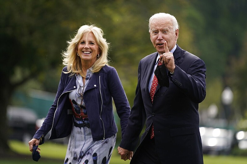 President Joe Biden and first lady Jill Biden arrive on the South Lawn of the White House after spending the weekend in Wilmington, Del., Monday, Oct. 4, 2021, in Washington. (AP/Evan Vucci)
