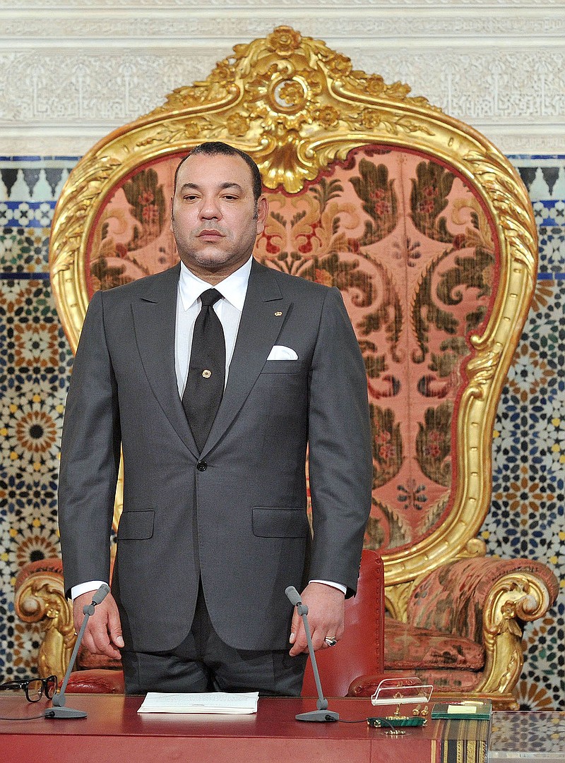 In this photo released by the Royal Palace, Morocco's King Mohammed VI  listens to the national anthem after he delivered a speech to the nation, Friday, June, 17, 2011 at the king's Palace in Rabat. Morocco's king delivered a landmark speech Friday night presenting new constitutional amendments that could transform the North African nation into a constitutional monarchy with a more powerful elected government. (AP Photo/ Azzouz Boukallouch, Royal Palace)