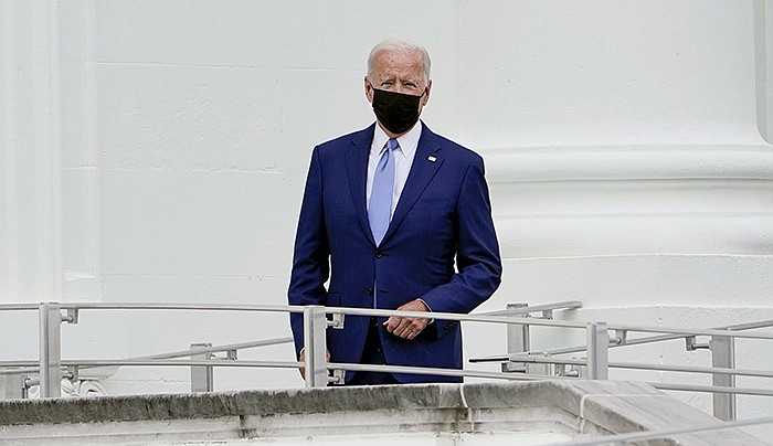 President Joe Biden arrives on the North Lawn of the White House for remarks Friday. Some legal experts say they believe Biden, as the sitting president, is likely to prevail over former President Donald Trump and his aides in a court fight over executive privilege, though the legal questions are significant.
(AP/Susan Walsh)