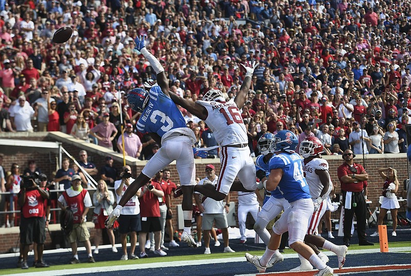 Arkansas wide receiver Treylon Burks (16) misses a pass for a two-point conversion, Saturday, October 9, 2021 during the fourth quarter of a football game at Vaught Hemingway Stadium in Oxford, Miss. Check out nwaonline.com/211010Daily/ for today's photo gallery. .(NWA Democrat-Gazette/Charlie Kaijo)