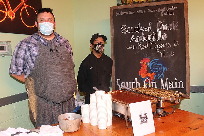 Stephen Burrow and Rich Montoya of South on Main at Drive Away Hunger, the Potluck Food Rescue benefit that took place Sept 30, 2021, at the Rail Yard in Little Rock..(Arkansas Democrat-Gazette -- Helaine R. Williams)