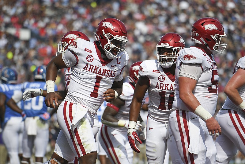 Arkansas quarterback KJ Jefferson (1) carries the ball for a score, Saturday, October 9, 2021 during the first quarter of a football game at Vaught Hemingway Stadium in Oxford, Miss. Check out nwaonline.com/211010Daily/ for today's photo gallery. .(NWA Democrat-Gazette/Charlie Kaijo) Arkansas quarterback KJ Jefferson (1) carries the ball for a score, Saturday, October 9, 2021 during the first quarter of a football game at Vaught Hemingway Stadium in Oxford, Miss. Check out nwaonline.com/211010Daily/ for today's photo gallery. .(NWA Democrat-Gazette/Charlie Kaijo)