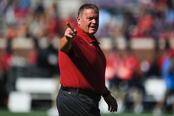 Arkansas coach Sam Pittman gestures toward the field on Saturday, Oct. 9, 2021 before a football game at Vaught-Hemingway Stadium in Oxford, Miss.