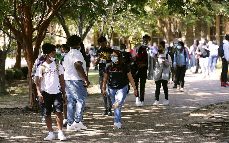 Little Rock Central High School students are dismissed early after the school was put on lockdown for a couple of hours after a shooting in the vicinity of the building on Tuesday, Oct. 12, 2021. (Arkansas Democrat-Gazette/Thomas Metthe)