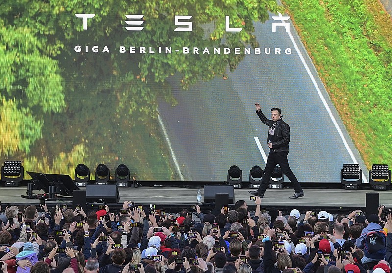 Tesla CEO Elon Musk arrives Saturday for an open house at the Tesla Gigafactory in Gruenheide, east of Berlin, where the first Tesla vehicles are set to roll off the production line by the end of the year. U.S. investigators have asked Tesla why it didn’t file recall documents when it updated Autopilot software to better identify parked emergency vehicles.
(AP/dpa/Patrick Pleul)