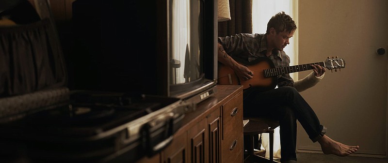 Down-on-his-luck troubadour Jesse (Michael Dorman) struggles with the changes in “Hard Luck Love Song,” a movie based on Todd Snider’s ballad “Just Like Old Times.”