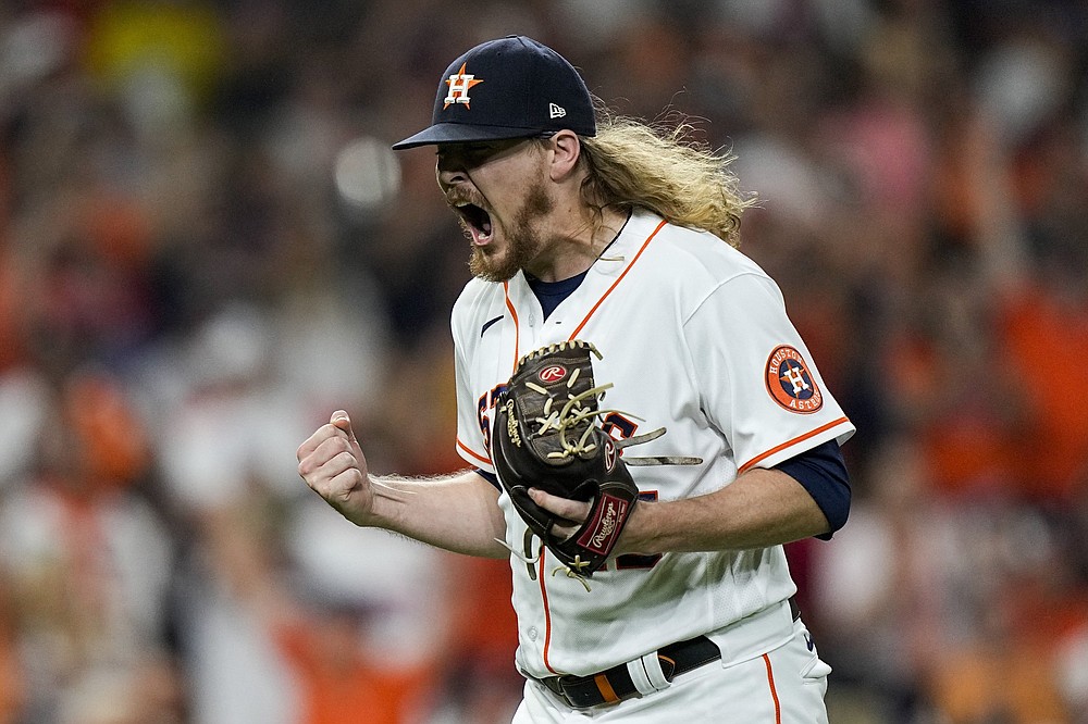 Houston reliever Ryne Stanek (Arkansas Razorbacks) celebrates Friday after getting J.D. Martinez to ground out in the top of the seventh inning as the Astros beat the Boston Red Sox 5-4 in Game 1 of the American League Championship Series at Minute Maid Park in Houston. Stanek picked up the victory.
(AP/David J. Phillip)