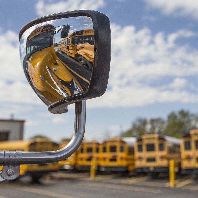 School busses park Thursday, April 16, 2020, at the Bentonville School District's bus barn in Bentonville.
(NWA Democrat-Gazette file photo)