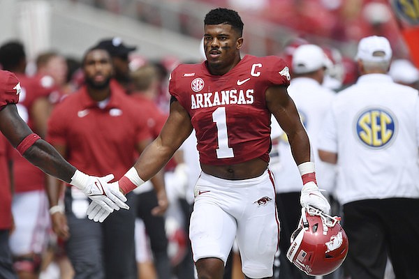 Arkansas' Jalen Catalon (1) against Rice during the first half of an NCAA college football game Saturday, Sept. 4, 2021, in Fayetteville. (AP Photo/Michael Woods)
