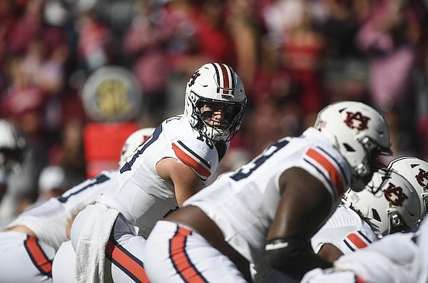 Auburn quarterback Bo Nix (10) prepares to take a snap during a game against Arkansas on Saturday, Oct. 16, 2021, in Fayetteville.