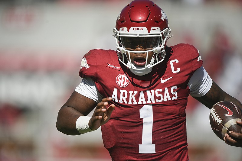 Arkansas quarterback KJ Jefferson (1) carries the ball, Saturday, October 16, 2021 during the third quarter of a football game at Reynolds Razorback Stadium in Fayetteville. Check out nwaonline.com/211017Daily/ for today's photo gallery. (NWA Democrat-Gazette/Charlie Kaijo)